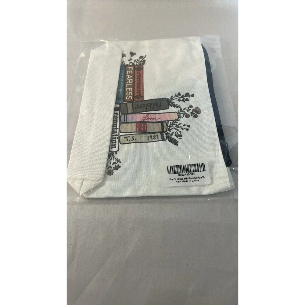 White and Black Cosmetic Bag with Books Design